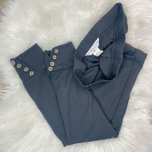 Trina Turk | Black leggings, button detail 2.0 skinny fit .